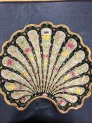 A HEREND SHELL SHAPED DISH, THE FLUTED PANELS DECORATED WITH FLOWERS ON ALTERNATING BLUE