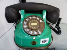 A VINTAGE FRENCH GREEN TELEPHONE.