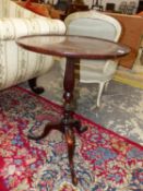 A 19th C. MAHOGANY TRIPOD TABLE, THE DISHED CIRCULAR TOP ON A REEDED BALUSTER COLUMN WITH A SPIRAL