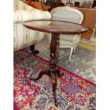 A 19th C. MAHOGANY TRIPOD TABLE, THE DISHED CIRCULAR TOP ON A REEDED BALUSTER COLUMN WITH A SPIRAL