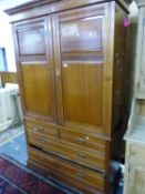 A VICTORIAN SATIN WALNUT LINEN PRESS, THE DOORS ENCLOSING FOUR SLIDES OVER TWO SHORT AND TWO