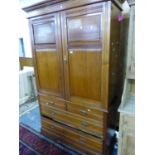 A VICTORIAN SATIN WALNUT LINEN PRESS, THE DOORS ENCLOSING FOUR SLIDES OVER TWO SHORT AND TWO