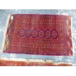 AN ANTIQUE TEKKE BOKHARA RUG, 156 x 101cms