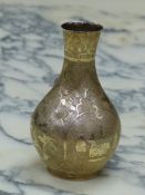 A CHINESE GILT METAL BOTTLE VASE INCISED WITH ALTERNATING ROUNDELS OF DEER AND BIRDS ON A STIPPLED G