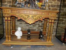 A LATE 19th C. PAINTED TWO TIER CONSOLE TABLE, THE GREEN TOP RAISED ABOVE A GREEN CHAIN AND FLOWER