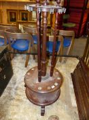 AN ANTIQUE MAHOGANY REVOLVING BILLIARD CUE STICK STAND, H. 141cms