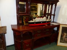 A LATE VICTORIAN MAHOGANY MIRROR BACKED SIDEBOARD, THE BASE WITH SHELVES OVER CUPBOARDS FLANKING TWO