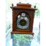 A VINTAGE CHIMING MANTEL CLOCK