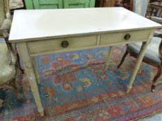 A 19th C. CREAM PAINTED SIDE TABLE, THE RECTANGULAR TOP ABOVE TWO DRAWER AND THE TAPERING