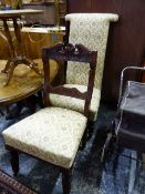 A VICTORIAN PRIE DIEU CHAIR AND EDWARDIAN SIDE CHAIR AND A MAHOGANY OCCASIONAL TABLE.