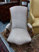 A 19th C. WALNUT ARMCHAIR, THE UPHOLSTERED BACK AND ELBOW RESTS ABOVE SCROLL HANDLES, THE SERPENTINE