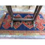 AN ANTIQUE CAUCASIAN KARABAGH RUG, 180 x 107cms