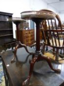 A PAIR OF MAHOGANY TRIPOD TABLES, THE CIRCULAR TOPS WITH COPPER GALLERIES, THE LEGS ON