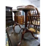 A PAIR OF MAHOGANY TRIPOD TABLES, THE CIRCULAR TOPS WITH COPPER GALLERIES, THE LEGS ON