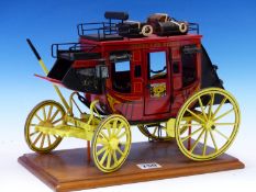 A VINTAGE WELL BUILT MODEL OF A ROYAL MAIL OVERLAND EXPRESS CARRIAGE MOUNTED ON WOODEN PLINTH