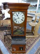 A NATIONAL TIME RECORDER OAK CASED CLOCKING IN CLOCK. H 109cms.