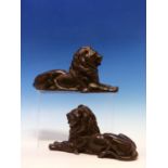 A PAIR OF BRONZED SPELTER RECLINING LIONS. W 25cms.