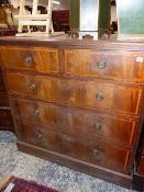 A LARGE EDWARDIAN MAHOGANY AND SATIN WOOD BANDED CHEST OF DRAWERS.