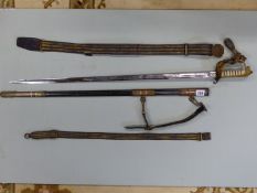 A GIEVES NAVAL OFFICERS SWORD, SCABBARD, BELT AND HANGER, A TASSELL HUNG FROM THE GUARD TO THE