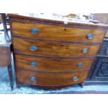 A 19TH CENTURY MAHOGANY BOW FRONT FOUR DRAWER CHEST.
