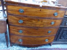 A 19TH CENTURY MAHOGANY BOW FRONT FOUR DRAWER CHEST.