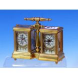 A COMBINED MINIATURE CARRIAGE CLOCK AND ANEROID BAROMETER, A BAR HANDLE CENTRAL TO THE TWO GLAZED