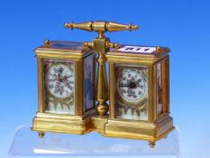 A COMBINED MINIATURE CARRIAGE CLOCK AND ANEROID BAROMETER, A BAR HANDLE CENTRAL TO THE TWO GLAZED