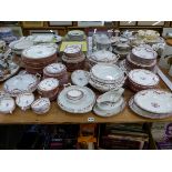 AN EDWARDIAN MINTONS AND MEAKIN EXTENSIVE DINNER SERVICE OF SIMILAR PATTERN.