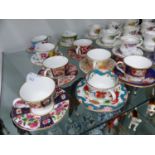 TWELVE MINIATURE ROYAL WORCESTER VARIOUS TEACUP AND SAUCERS, TOGETHER WITH STAFFORDSHIRE ELIZABETHAN