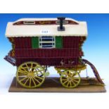 A SCRATCH BUILT SCALE MODEL OF A ROMANY GYPSY TRAVELLERS WAGON / VARDO. 35cms.