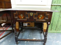 AN 18th C. OAK SIDE TABLE, THE DRAWER WITH BRASS DROP HANDLES SET IN CRUCIFORM PANELS ABOVE BALUSTER