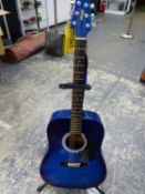 A STAGG BLUE ACOUSTIC GUITAR WITH A STAGG STAND