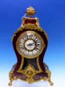 AN ORMOLU MOUNTED TORTOISESHELL CASED HENRI MARC BALLOON SHAPED MANTEL CLOCK STRIKING ON A COILED