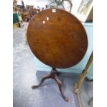 A GEORGE III MAHOGANY TILT TOP TRIPOD TABLE, THE CIRCULAR TOP ON BALUSTER COLUMN AND LEGS WITH LONG