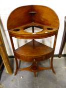 A 19th C. LINE INLAID MAHOGANY CORNER WASH STAND, THE TOP PIERCED TO TAKE A BOWL AND TWO TUMBLERS,