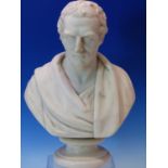 A WHITE MARBLE BUST OF THE DUKE OF WELLINGTON DRAPED IN A TOGA AND ON A SOCLE BASE. H 35.5cms.