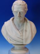 A WHITE MARBLE BUST OF THE DUKE OF WELLINGTON DRAPED IN A TOGA AND ON A SOCLE BASE. H 35.5cms.