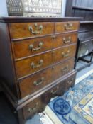 AN 18th C. WALNUT CHEST ON STAND, THE TOP WITH TWO SHORT AND THREE GRADED LONG DRAWERS ON PLINTH