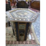 AN ISLAMIC HEXAGONAL TABLE GEOMETRICALLY INLAID IN MOTHER OF PEARL AND EBONY, DIAMOND DIAPER