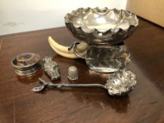 A HALLMARKED SILVER DISH SUPPORTED ON LEAF STAND WITH BOAR'S TUSK, A SIFTER, A THIMBLE, A TRINKET BO