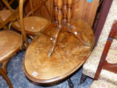 A VICTORIAN WALNUT OVAL TOP TABLE REDUCED AS A COFFEE TABLE.