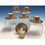 A CROWN DERBY 2451 IMARI PATTERN SET OF SIX COFFEE CANS AND SAUCERS, DATE CODES MAINLY FOR 1926-7