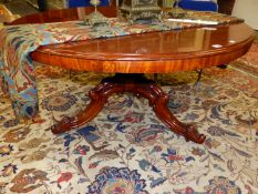 A VICTORIAN MAHOGANY BREAKFAST TABLE, THE CIRCULAR TOP ON A BALUSTER COLUMN, THE THREE LEGS SWEEPING