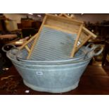 TWO VINTAGE GALVANIZED WASH TUBS AND TWO WASH BOARDS.