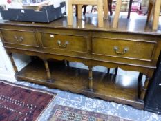 A GEORGIAN STYLE OAK POT BOARD DRESSER.