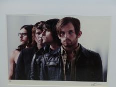 •DEAN CHALKLEY. ARR. KINGS OF LEON, SIGNED LIMITED EDITION COLOUR PHOTOGRAPHIC PRINT, 2/25. 44 x