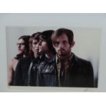 •DEAN CHALKLEY. ARR. KINGS OF LEON, SIGNED LIMITED EDITION COLOUR PHOTOGRAPHIC PRINT, 2/25. 44 x