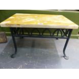 A SMALL MARBLE TOP TABLE WITH WROUGHT IRON BASE.