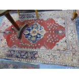 AN ANTIQUE TURKISH RUG, 194 x 128cms