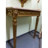 A 19th C. PINK AND OCHRE MOTTLED MARBLE TOPPED GILT WOOD PIER TABLE, THE APRON SWAGGED WITH